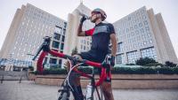 cyclist drinking from a water bottle